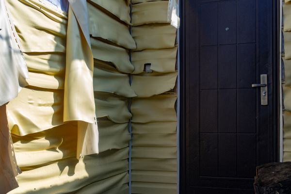 Melted Siding Replacement in Utica