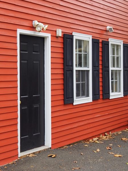 Red Vinyl Siding Installation in Utica