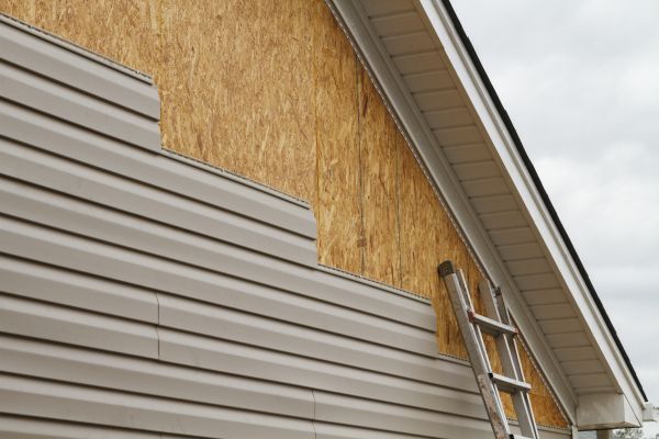 Grey Vinyl Siding Installation in Utica