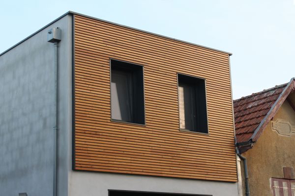 Treated Wood Siding Repair in Utica
